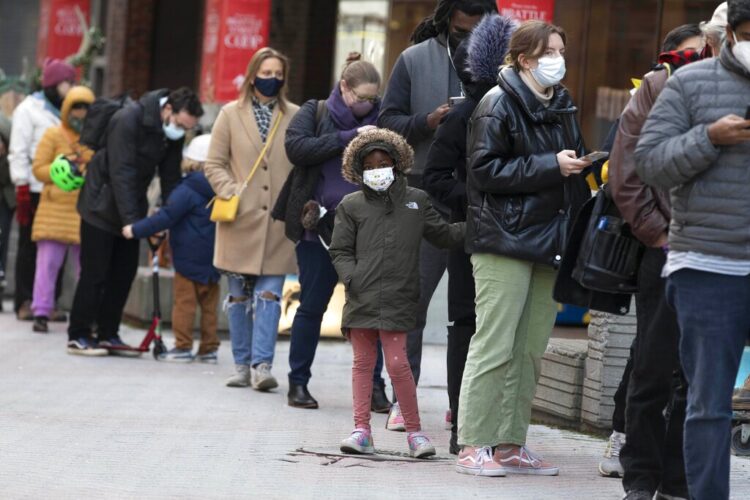 COVID cases spike even as US reaches vaccine milestone